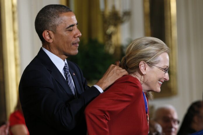 U.S. President Obama presents the Presidential Medal of Freedom to actress Streep during a White House ceremony in Washington