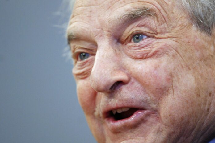 George Soros, chairman of the Soros Fund Management and Open Society, speaks during an interview with Reuters in New York
