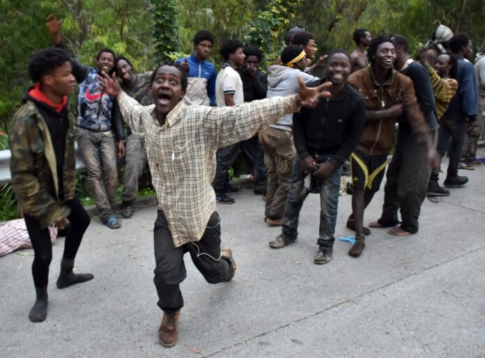 TOPSHOT-SPAIN-EU-MOROCCO-MIGRANTS