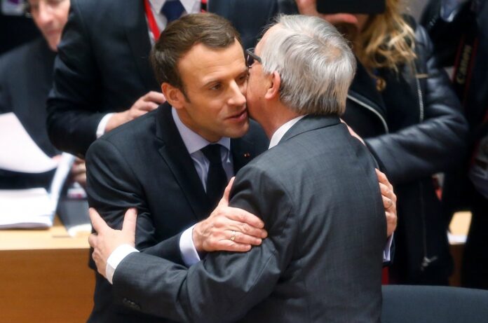 French President Macron and EU Commission President Juncker attend a EU leaders summit in Brussels
