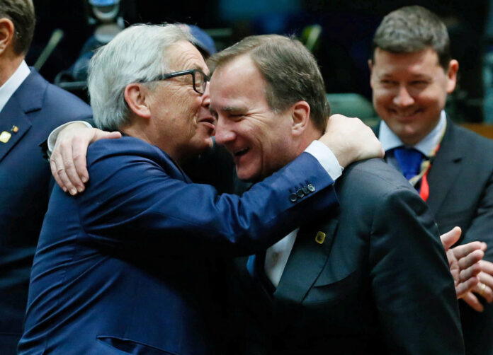 European Commission President Jean Claude Juncker and Sweden's Prime Minister Stefan Lofven attend a EU Summit in Brussels