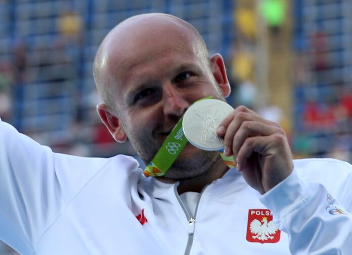 Athletics - Men's Discus Throw Victory Ceremony