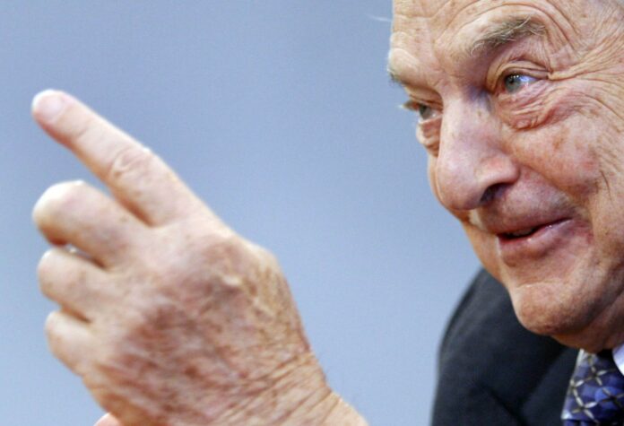 George Soros, chairman of the Soros Fund Management and Open Society, speaks during an interview with Reuters in New York