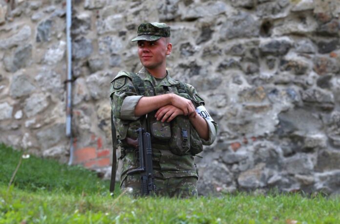 A Slovakian military police officer keeps guard outside the Bratislava Castle ahead of an upcoming European Union summit in Bratislava
