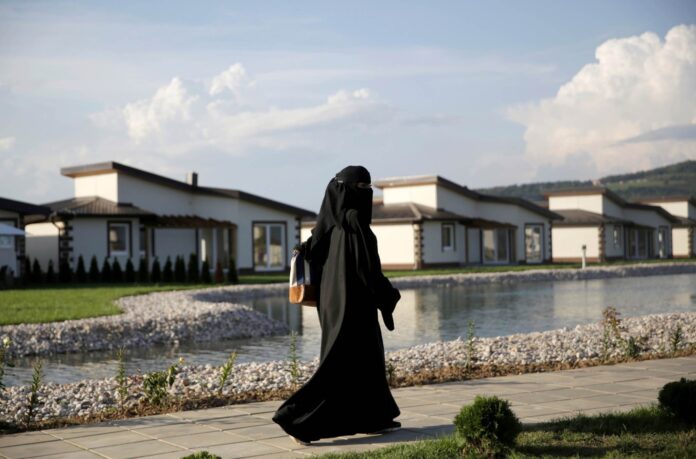Tourist walks through Sarajevo Resort in Osenik near Sarajevo