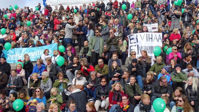 Protesters take part in a demonstration against racism and far right movements in downtown Helsinki, Finland