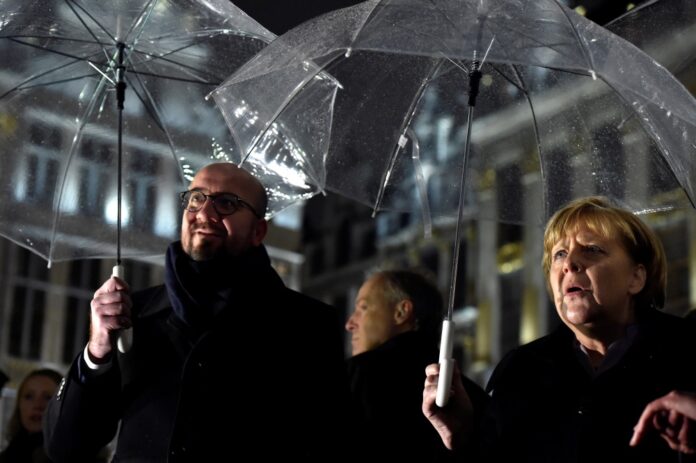 Germany's Chancellor Merkel visits the Grand Place with Belgium's PM Michel in Brussels