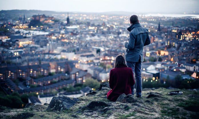 Couple on hill in Edinburgh