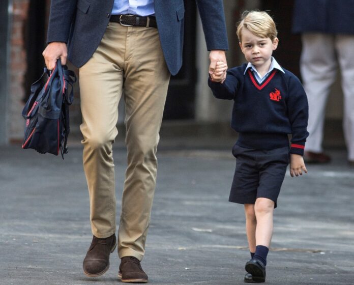 Britain's Prince William accompanies his son Prince George on his first day of school at Thomas's school in Battersea, London