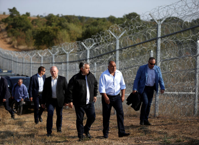 Hungarian PM Orban and his Bulgarian counterpart Borisov inspect the barbed wire fence constructed on the Bulgarian-Turkish border