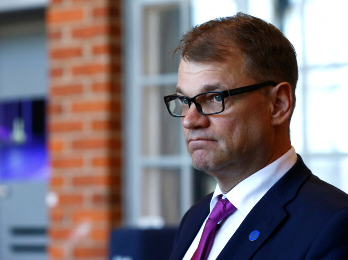 Finland's Prime Minister Sipila listens to media in Porvoo