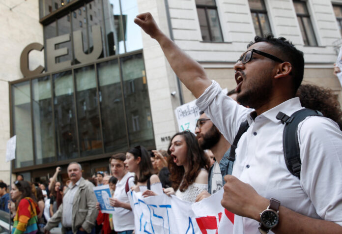 Students shout slogans during a demonstration against Prime Minister Viktor Orban's efforts to force a George Soros-founded university out of the country in Budapest