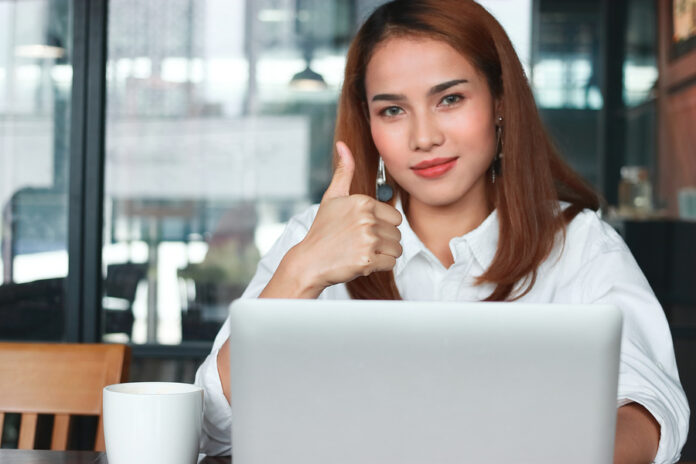 Selective Focus On Hands Of Confident Young Asian Business Woman