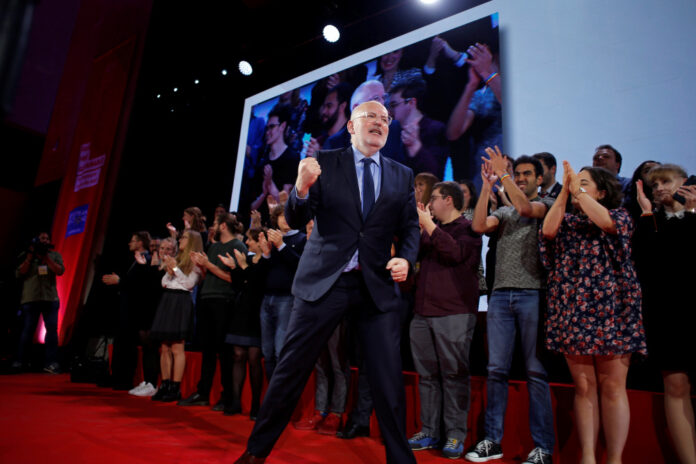 Frans Timmermans, the newly elected Party of European Socialists President, celebrates during the Party of European Socialists annual meeting in Lisbon