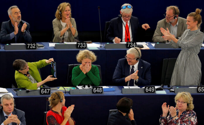 MEPs take part in a voting session at the European Parliament in Strasbourg